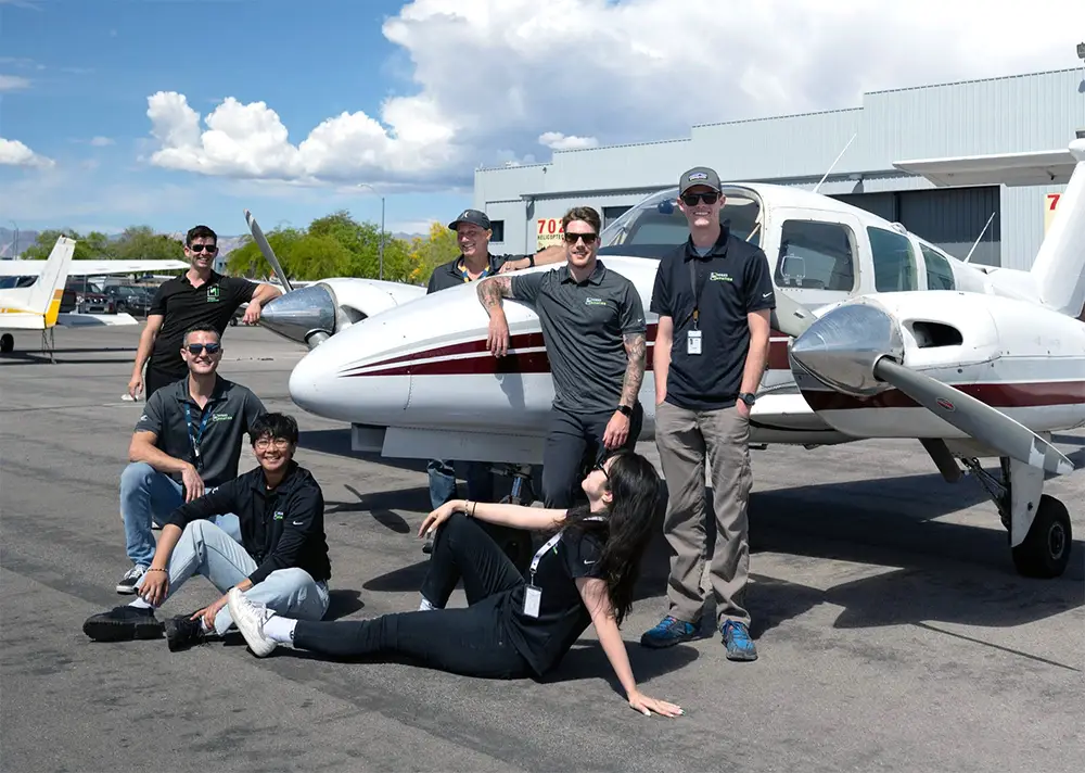 Vegas Aviation's CFI team in front of a plane