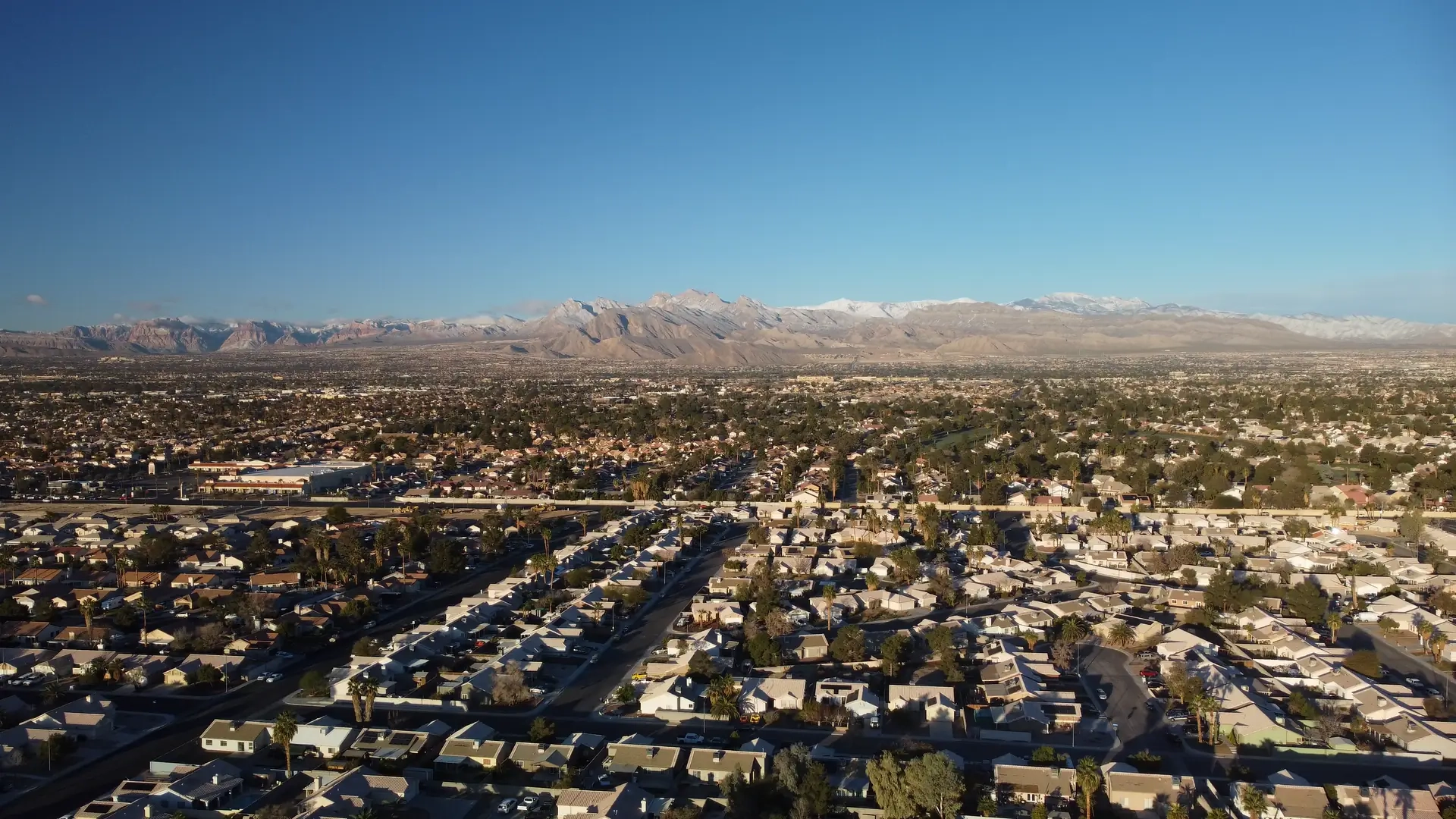 Las Vegas landscape seen from the air with mountain range in the background