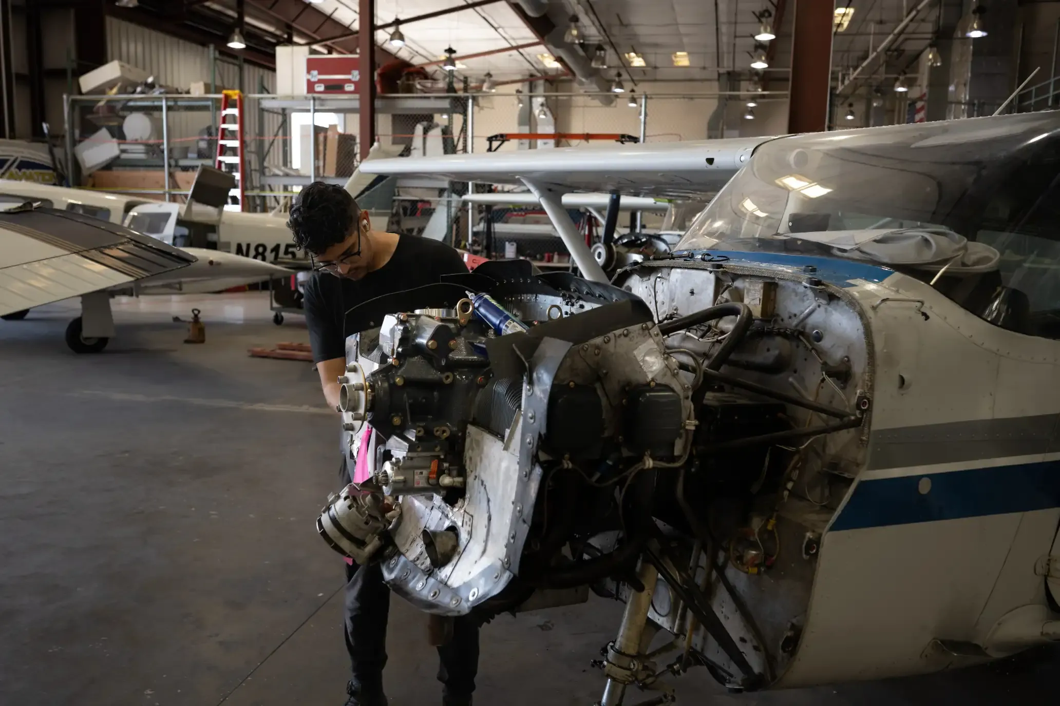 Mechanic working on an aircraft's engine