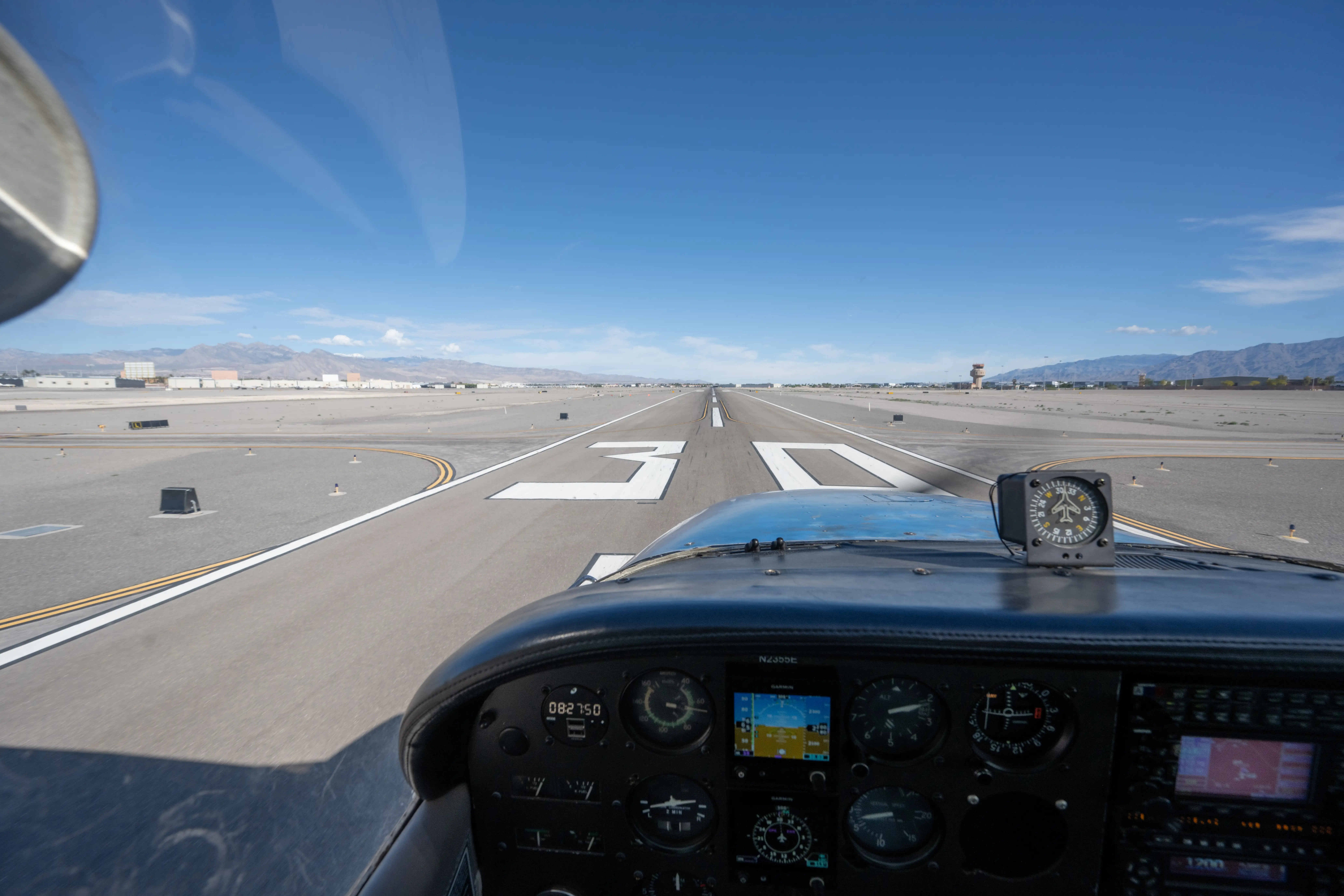Training aircraft taking off from a runway in Nevada